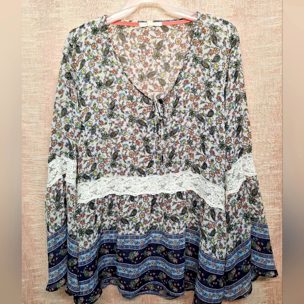 Ladies size 2X  multicolor sheer top.